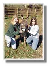 Hot Chocolate with his proud new owners! (7391 bytes)